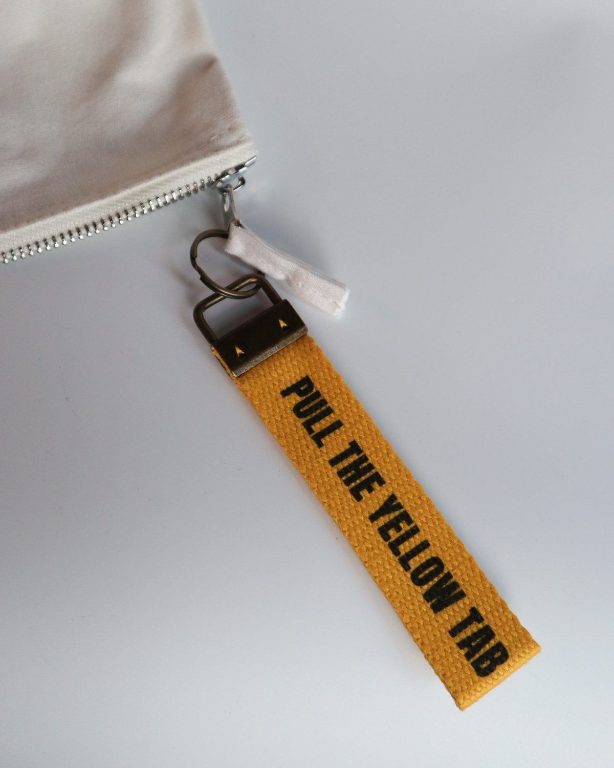 Pull The Yellow Tab Keyring