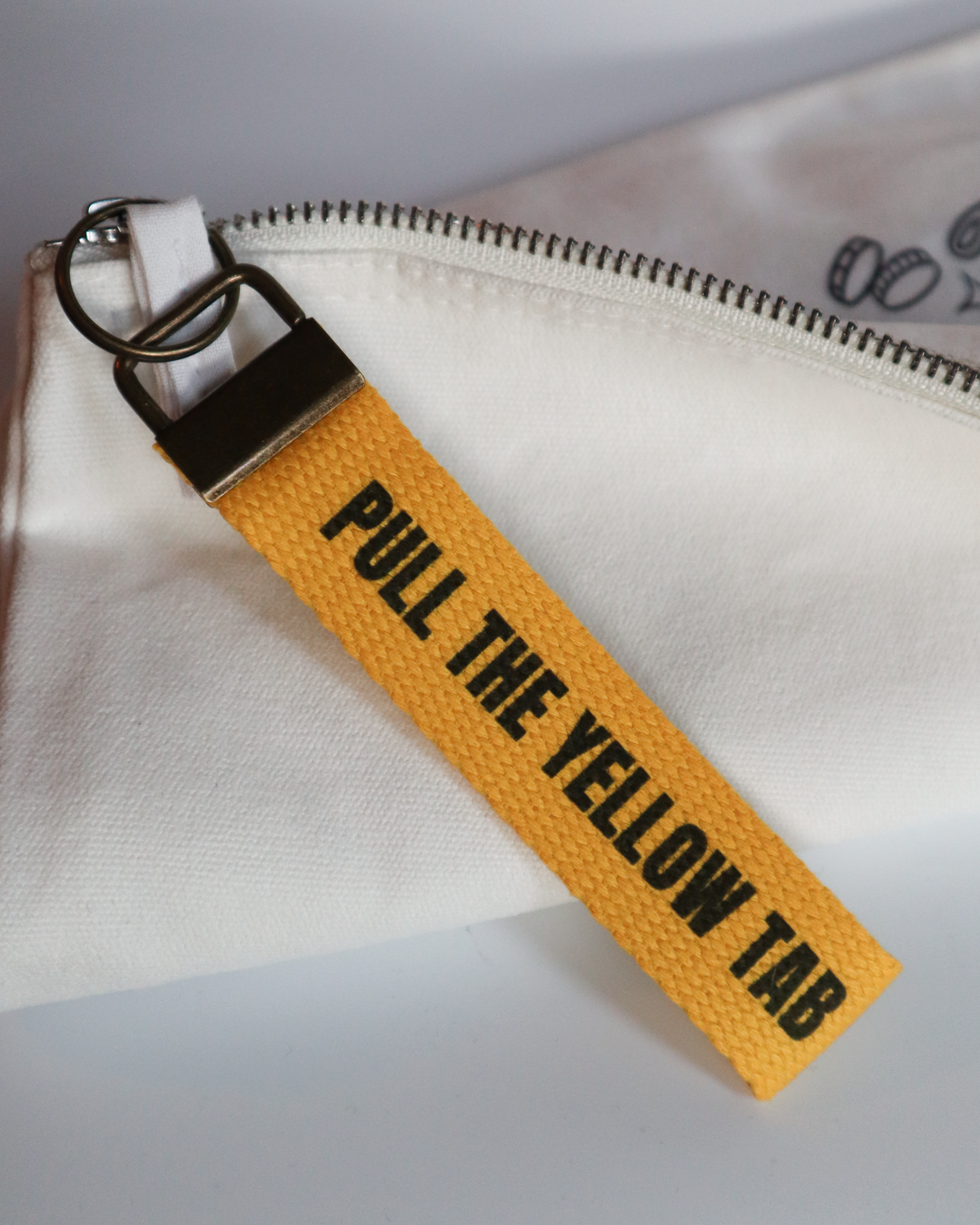 Pull The Yellow Tab Keyring